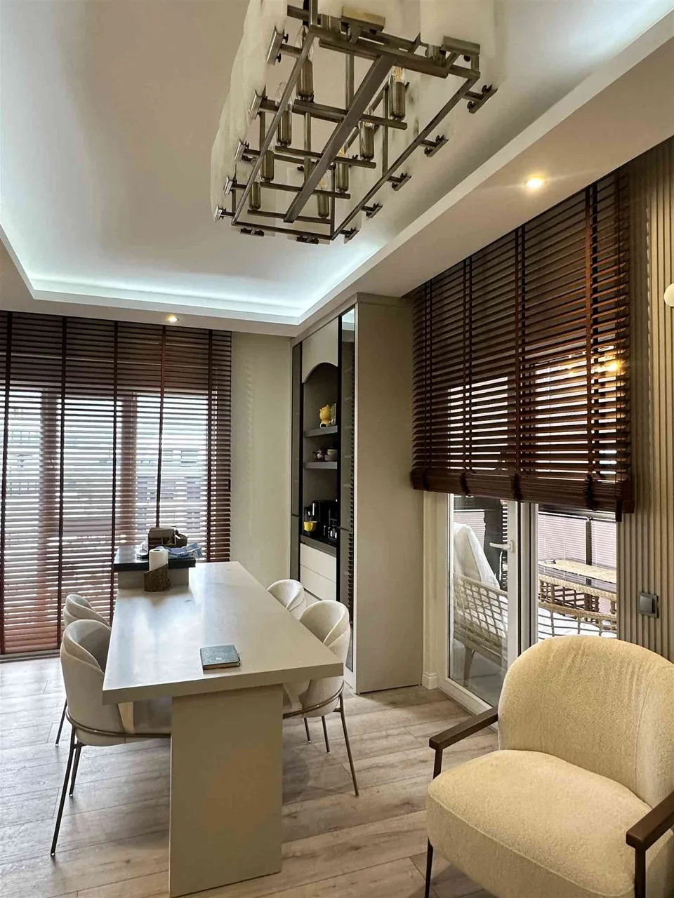 Curtains and furniture in a living and dining area